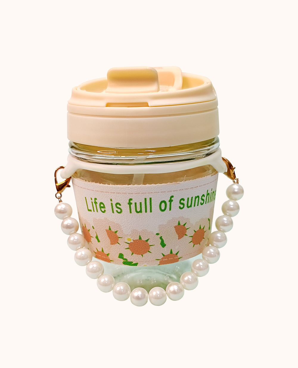 Stylish Coffee Mug with ChainStylish Coffee Mug with Tote Chain, Tulip Glass 350ml
Brighten your day with CeePoo’s Mini Glass Travel Mug, a chic and practical companion available in charming peaMugStylish Coffee Mug