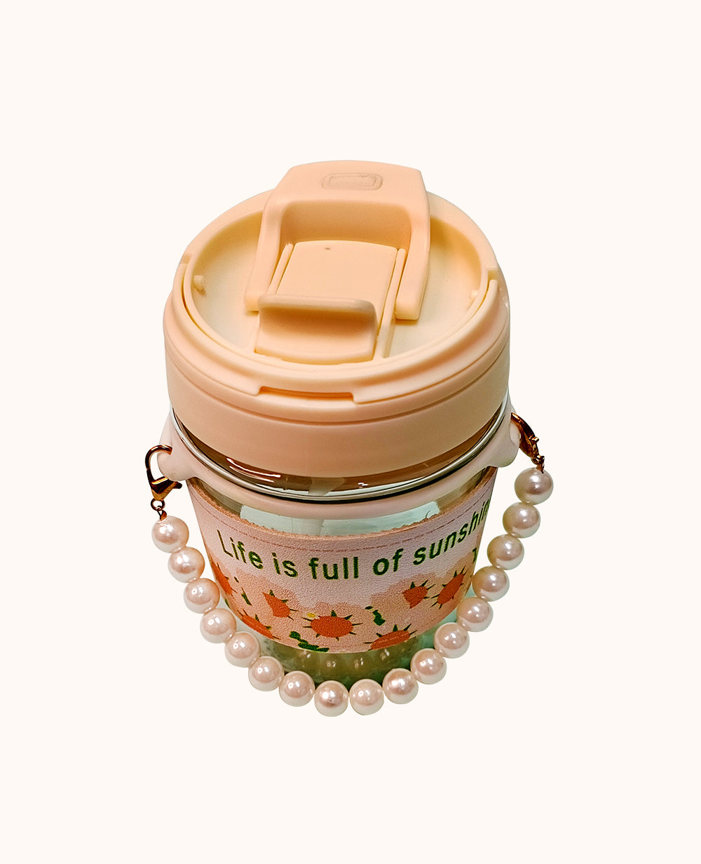 Stylish Coffee Mug with ChainStylish Coffee Mug with Tote Chain, Tulip Glass 350ml
Brighten your day with CeePoo’s Mini Glass Travel Mug, a chic and practical companion available in charming peaMugStylish Coffee Mug