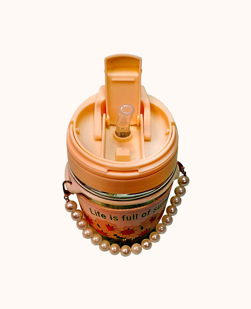 Stylish Coffee Mug with ChainStylish Coffee Mug with Tote Chain, Tulip Glass 350ml
Brighten your day with CeePoo’s Mini Glass Travel Mug, a chic and practical companion available in charming peaMugStylish Coffee Mug