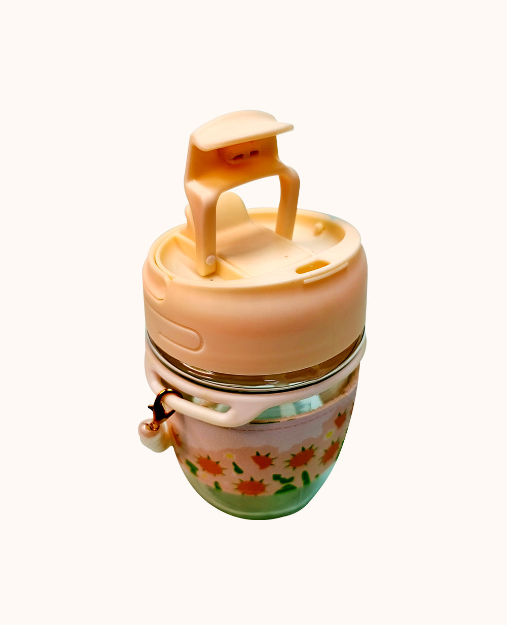 Stylish Coffee Mug with ChainStylish Coffee Mug with Tote Chain, Tulip Glass 350ml
Brighten your day with CeePoo’s Mini Glass Travel Mug, a chic and practical companion available in charming peaMugStylish Coffee Mug